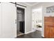 Convenient laundry room with washer hookups behind a sliding door, offering both functionality and style at 1711 Terry Mill Se Rd, Atlanta, GA 30316