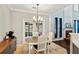 Bright dining room with a view of the living room and backyard at 2267 Howell Farms Trl, Acworth, GA 30101