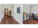 Hallway view with doorways leading into rooms with hardwood floors at 2267 Howell Farms Trl, Acworth, GA 30101