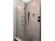 Beautiful shower with multiple shower heads and black hardware at 2469 River Oak Dr, Decatur, GA 30033