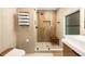 Stylish bathroom featuring a glass shower, wood-look tiling, and modern fixtures at 2469 River Oak Dr, Decatur, GA 30033