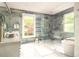 Modern bathroom with double sink vanity, walk-in shower, and separate soaking tub at 2469 River Oak Dr, Decatur, GA 30033