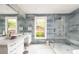 Bathroom with double sink vanity, stone counters, and spacious glass shower at 2469 River Oak Dr, Decatur, GA 30033