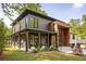Stunning modern home with a welcoming entrance and a well-manicured lawn at 2469 River Oak Dr, Decatur, GA 30033