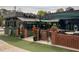 Charming neighborhood restaurant with covered patio, brick accents, and flower boxes for curb appeal at 2469 River Oak Dr, Decatur, GA 30033