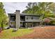 The home features a large backyard, covered patio and a second story balcony at 2469 River Oak Dr, Decatur, GA 30033