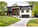 Inviting modern home featuring a well-maintained lawn and a convenient driveway at 2469 River Oak Dr, Decatur, GA 30033