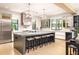 Bright kitchen featuring stainless steel appliances, modern cabinetry, marble countertops and counter seating at 2469 River Oak Dr, Decatur, GA 30033