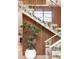 Contemporary staircase features glass railings, wood treads, and a feature wall at 2469 River Oak Dr, Decatur, GA 30033