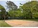 Outdoor sand volleyball court surrounded by lush greenery, perfect for a recreational game at 2469 River Oak Dr, Decatur, GA 30033
