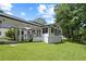 Sprawling backyard featuring a white exterior, screened porch, and lush green grass at 269 Red Gate Dr, Canton, GA 30115