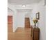 Light and bright entryway with hardwood floors and view of wooden staircase at 269 Red Gate Dr, Canton, GA 30115