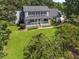 Charming two-story home with a welcoming front porch and well-manicured lawn at 269 Red Gate Dr, Canton, GA 30115