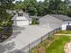 Aerial view of the home's entrance featuring a two-car garage, driveway, and fenced-in yard at 269 Red Gate Dr, Canton, GA 30115