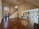 Open floor plan showcasing the living room, kitchen, and sunroom with hardwood floors and natural light at 71 Tobinleigh Ct, Acworth, GA 30101