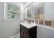 Bathroom features a stylish vanity, neutral tiling, and natural light at 244 Pauladean Se Cir, Marietta, GA 30067
