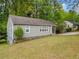 Charming home featuring a landscaped yard, screen porch, and gray siding at 244 Pauladean Se Cir, Marietta, GA 30067