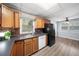 Kitchen with wood cabinets, laminate counters, and stainless steel appliances at 244 Pauladean Se Cir, Marietta, GA 30067