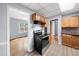 Kitchen featuring laminate floors, neutral paint and wood cabinets at 244 Pauladean Se Cir, Marietta, GA 30067