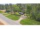 Overhead aerial shot of home sitting on a large lot surrounded by trees at 3917 Dallas Acworth Nw Hwy, Acworth, GA 30101