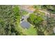 Aerial view of single-Gathering home with greenery, a road and private driveway at 3917 Dallas Acworth Nw Hwy, Acworth, GA 30101