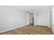 Bright bedroom featuring hardwood floors and a closet for storage at 3917 Dallas Acworth Nw Hwy, Acworth, GA 30101