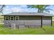 Side view of home showing gray siding, an AC unit and stairs at 3917 Dallas Acworth Nw Hwy, Acworth, GA 30101