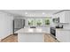 Bright kitchen featuring stainless steel appliances, granite counters and a central island at 3917 Dallas Acworth Nw Hwy, Acworth, GA 30101