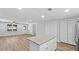 Bright kitchen features an island, and modern vinyl flooring throughout at 3917 Dallas Acworth Nw Hwy, Acworth, GA 30101