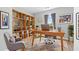 Cozy office featuring hardwood floors, built-in bookcase, modern decor and a nice rug at 3917 Dallas Acworth Nw Hwy, Acworth, GA 30101