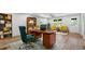 Bright office with a nice desk, hardwood floors, and vintage yellow chairs at 3917 Dallas Acworth Nw Hwy, Acworth, GA 30101