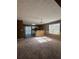 Open kitchen layout with bar seating, stainless appliances, and dining area with natural light at 4194 Wesley Ln, Decatur, GA 30035