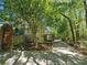 Long driveway leading to a secluded home surrounded by lush greenery at 610 Brington Close, Alpharetta, GA 30022