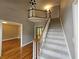 Entryway with a stairway and railing leading to the second floor at 610 Brington Close, Alpharetta, GA 30022