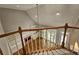 View of the living room with a fireplace, built-in shelving, and access to the outside at 610 Brington Close, Alpharetta, GA 30022