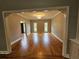 Formal Living room with hardwood floors and natural light at 610 Brington Close, Alpharetta, GA 30022