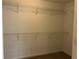 Spacious walk-in closet with built-in wire shelving for optimal organization and storage at 713 Parkside Dr, Woodstock, GA 30188