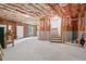 Unfinished basement featuring concrete floor and insulated ceiling, offering potential for customization and expansion at 2591 Boulder Hill Se Ct, Atlanta, GA 30316