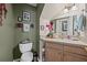 Well-lit bathroom featuring granite countertops and vanity at 2591 Boulder Hill Se Ct, Atlanta, GA 30316