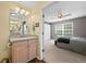 Bathroom with granite countertops, modern fixtures, and view into bedroom at 2591 Boulder Hill Se Ct, Atlanta, GA 30316