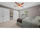 Bedroom with neutral tones and two closets for ample storage at 2591 Boulder Hill Se Ct, Atlanta, GA 30316
