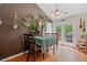 Inviting dining area with hardwood floors, chandelier, and French doors to the backyard at 2591 Boulder Hill Se Ct, Atlanta, GA 30316