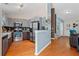 Modern kitchen with stainless steel appliances, gray cabinets, and a breakfast bar at 2591 Boulder Hill Se Ct, Atlanta, GA 30316