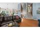 Open concept living and dining area with hardwood floors and access to the staircase at 2591 Boulder Hill Se Ct, Atlanta, GA 30316