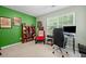 Bright and airy office space with green walls and a window at 2591 Boulder Hill Se Ct, Atlanta, GA 30316