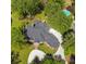 Aerial view of estate featuring lush greenery, expansive driveway, and pool area at 3 Woodlawn Ne Dr, Marietta, GA 30067