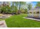 The manicured backyard features a gazebo and outdoor seating, perfect for enjoying the serene surroundings at 3 Woodlawn Ne Dr, Marietta, GA 30067