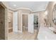 Spacious bathroom with a shower and marble countertop at 3 Woodlawn Ne Dr, Marietta, GA 30067
