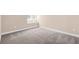 Carpeted room with natural light from the windows at 3 Woodlawn Ne Dr, Marietta, GA 30067