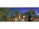 Elegant brick home with manicured landscaping, fountain, and grand entrance at 3 Woodlawn Ne Dr, Marietta, GA 30067